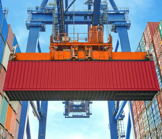 A crane lifting a container